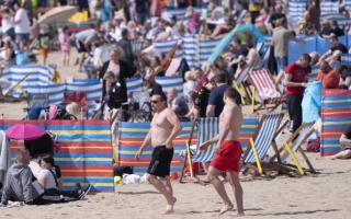 Heatwave sparks urgent skin cancer warning to UK men from Cancer Research. (PA)