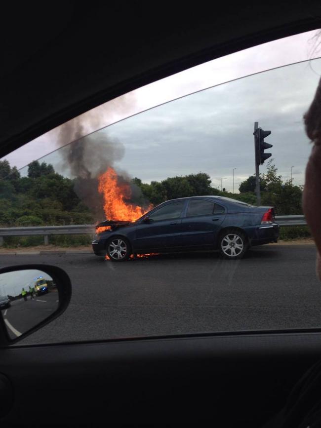 The car on fire at the Bicester roundabout. Picture: Samantha Amott